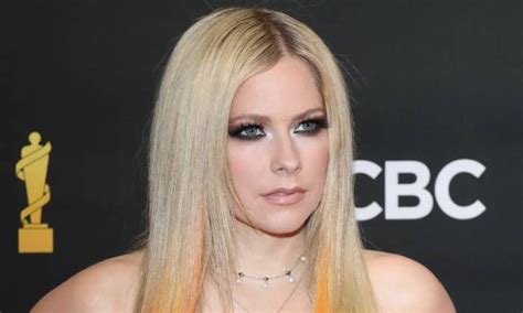 avril lavigne versace nude|Avril Lavigne ditches her trademark stage look for new Versace .